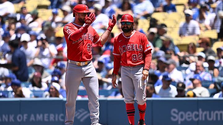 Angels catcher Sebastián Rivero (38) reacts at first base after hitting an RBI single against the Los Angeles Dodgers during the second inning at Dodger Stadium on June 7, 2026.