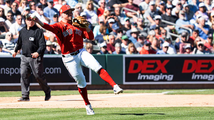 Caleb Durbin of the Boston Red Sox throws an out during spring training game against the Pittsburgh Pirates at JetBlue Park in Fort Myers on Tuesday, Feb. 24, 2026. I