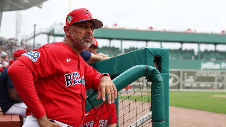 Feb 22, 2026; Fort Myers, Florida, USA;  Boston Red Sox manager Alex Cora (13) looks on during the first inning against the Toronto Blue Jays at JetBlue Park at Fenway South. Mandatory Credit: Kim Klement Neitzel-Imagn Images