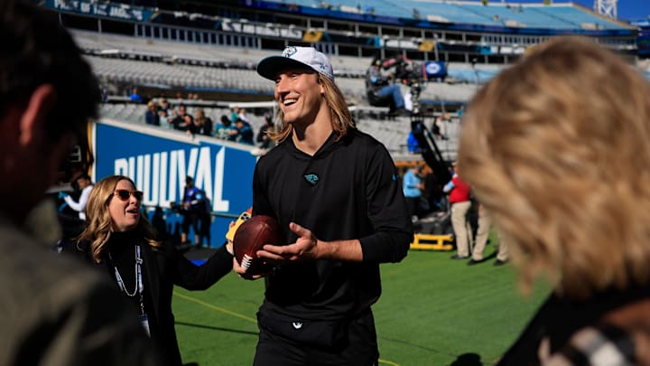 Jacksonville Jaguars quarterback Trevor Lawrence (16) greets fans before an NFL football matchup Sunday, Dec. 1, 2024 at EverBank Stadium in Jacksonville, Fla. [Corey Perrine/Florida Times-Union]