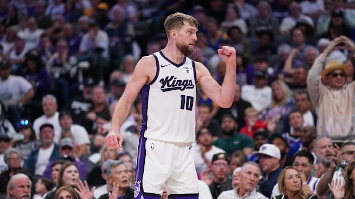 Apr 16, 2024; Sacramento, California, USA; Sacramento Kings forward Domantas Sabonis (10) pumps his fist after the Kings made a basket against the Golden State Warriors in the fourth quarter during a play-in game of the 2024 NBA playoffs at the Golden 1 Center. Mandatory Credit: Cary Edmondson-Imagn Images