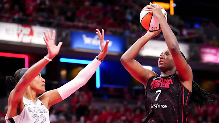 Las Vegas Aces center A'ja Wilson (22) defends Indiana Fever forward Aliyah Boston.