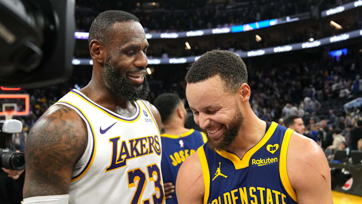 Los Angeles Lakers forward LeBron James and Golden State Warriors guard Stephen Curry talk after the game at Chase Center. Los Angeles Lakers forward LeBron James and Golden State Warriors guard Stephen Curry talk after the game at Chase Center.