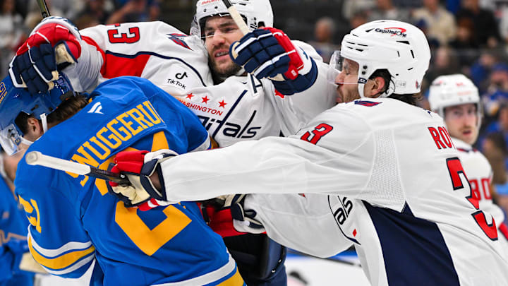 Mar 24, 2026; St. Louis, Missouri, USA; Washington Capitals right wing Tom Wilson (43) and defenseman Matt Roy (3) get in a scrum with St. Louis Blues right wing Jimmy Snuggerud (21) during the second period at Enterprise Center. Mandatory Credit: Jeff Curry-Imagn Images