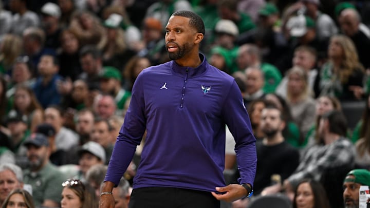 Apr 11, 2025; Boston, Massachusetts, USA; Charlotte Hornets head coach Charles Lee reacts to game action during the first half against the Boston Celtics at TD Garden. Mandatory Credit: Eric Canha-Imagn Images
