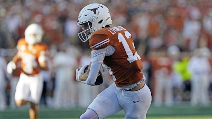 Former Texas receiver Parker Livingstone hauls in a touchdown against Arkansas.