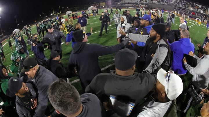 The early stages of the near rumble post game after Grant's 35-28 win over Oxnard Pacifica in the CIF Division 2-AA championship game at Saddleback College in Mission Viejo. 