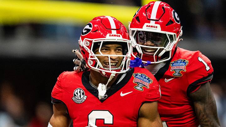 Georgia defensive back Daylen Everette (6) celebrates with Georgia defensive back Ellis Robinson IV (1) after returning a fumble for a touchdown during the Sugar Bowl and College Football Playoff quarterfinals at Caesars Superdome in New Orleans, La., on Thursday, Jan. 1, 2026. Ole Miss defeated Georgia 39-34.