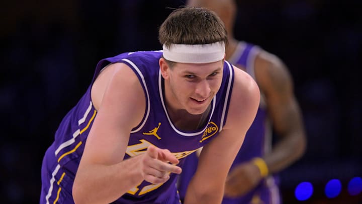 Feb 5, 2026; Los Angeles, California, USA;  Los Angeles Lakers guard Austin Reaves (15) reacts after a foul in the second half against the Philadelphia 76ers at Crypto.com Arena. Mandatory Credit: Jayne Kamin-Oncea-Imagn Images