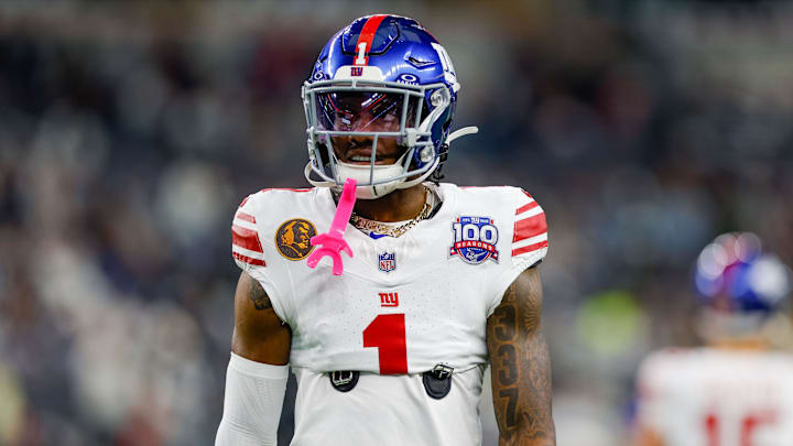 Nov 28, 2024; Arlington, Texas, USA; New York Giants wide receiver Malik Nabers (1) warms up prior to the game against the Dallas Cowboys at AT&T Stadium. Mandatory Credit: Andrew Dieb-Imagn Images