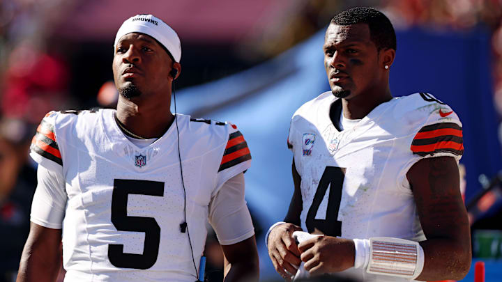 Oct 6, 2024; Landover, Maryland, USA; Cleveland Browns quarterback Deshaun Watson (4) and quarterback Jameis Winston (5) stand on the sideline during the fourth quarter of the game against the Washington Commanders at NorthWest Stadium. Mandatory Credit: Peter Casey-Imagn Images