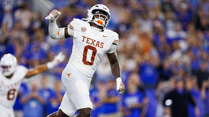 Oct 18, 2025; Lexington, Kentucky, USA; Texas Longhorns linebacker Anthony Hill Jr. (0) celebrates after the Kentucky Wildcats fail to score in overtime at Kroger Field. Mandatory Credit: Jordan Prather-Imagn Images