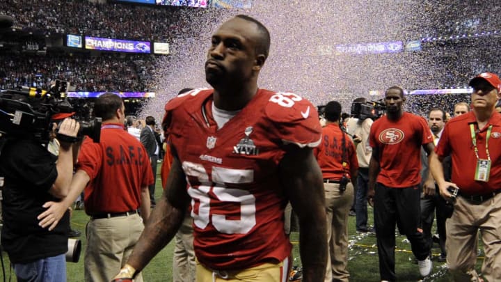 Feb 3, 2013; New Orleans, LA, USA; San Francisco 49ers tight end Vernon Davis (85) leaves the field after being defeated by the Baltimore Ravens in Super Bowl XLVII at the Mercedes-Benz Superdome. Mandatory Credit: Robert Deutsch-USA TODAY Sports