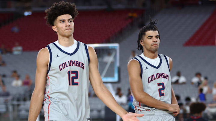 Jun 24, 2023; Glendale, AZ, USA; Columbus player Cameron Boozer (12) and brother Cayden Boozer (2) during the Section 7 high school boys tournament at State Farm Stadium. Mandatory Credit: Mark J. Rebilas-Imagn Images