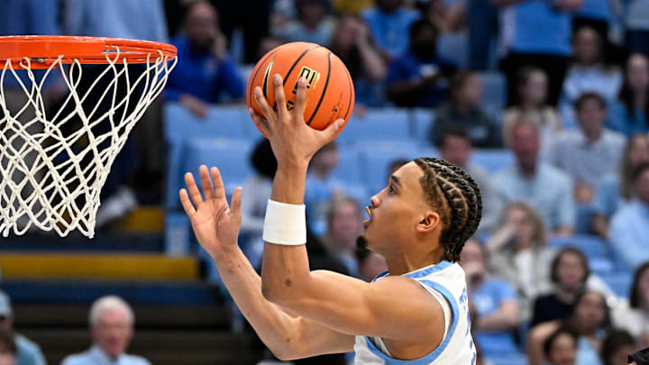 Mar 8, 2025; Chapel Hill, North Carolina, USA; North Carolina Tar Heels guard Seth Trimble (7) shoots in the second half at Dean E. Smith Center. Mandatory Credit: Bob Donnan-Imagn Images