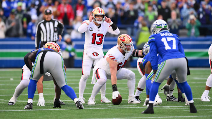 Oct 10, 2024; Seattle, Washington, USA; San Francisco 49ers quarterback Brock Purdy (13) during the first half against the Seattle Seahawks at Lumen Field. Mandatory Credit: Steven Bisig-Imagn Images