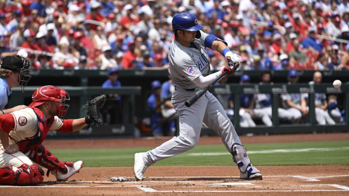 Jul 13, 2024; St. Louis, Missouri, USA; Chicago Cubs outfielder Seiya Suzuki (27) hits a home run against the St. Louis Cardinals during the first inning at Busch Stadium. Jul 13, 2024; St. Louis, Missouri, USA; Chicago Cubs outfielder Seiya Suzuki (27) hits a home run against the St. Louis Cardinals during the first inning at Busch Stadium.
