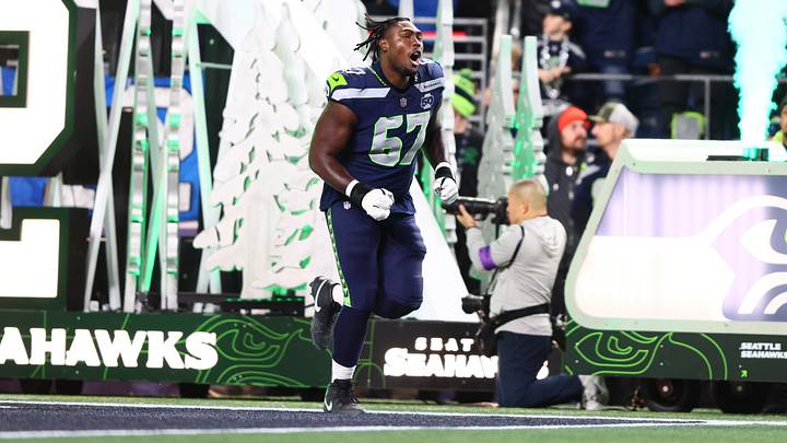 Seattle Seahawks offensive tackle Charles Cross (67) takes the field prior to a game against the San Francisco 49ers in an NFC Divisional Round game. Seattle Seahawks offensive tackle Charles Cross (67) takes the field prior to a game against the San Francisco 49ers in an NFC Divisional Round game.