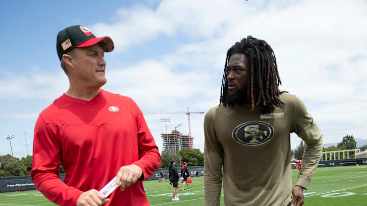 San Francisco 49ers general manager John Lynch (L) and wide receiver Brandon Aiyuk (R)