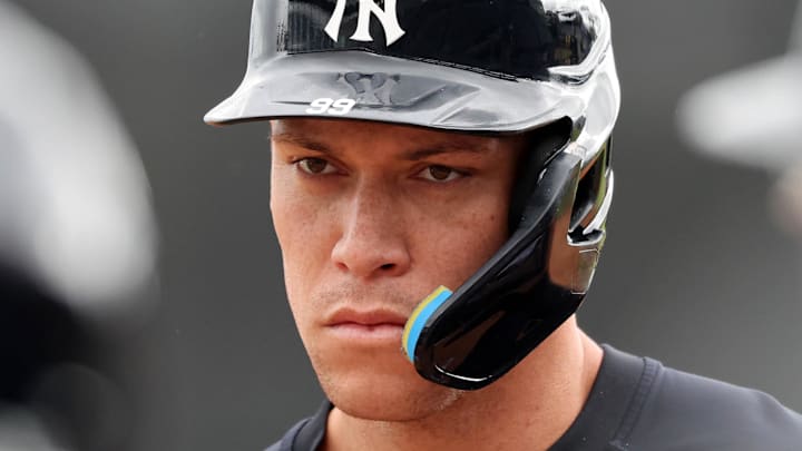 Judge looks on during work outs. 