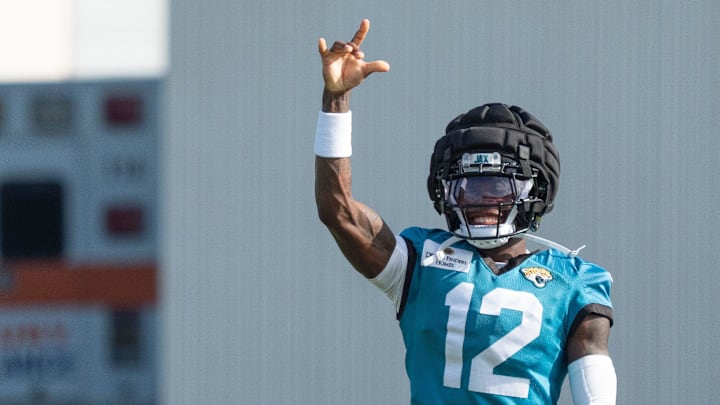 Jacksonville Jaguars wide receiver Travis Hunter (12) tosses the ball after running a route during the Jaguar’s 12th NFL training camp session at the Miller Electric Center, Thursday, Aug. 7, 2025, in Jacksonville, Fla. [Doug Engle/Florida Times-Union]