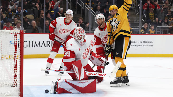 Jan 1, 2026; Pittsburgh, Pennsylvania, USA;  Pittsburgh Penguins right wing Bryan Rust (17) reacts to the game winning goal against the Detroit Red Wings in overtime at PPG Paints Arena. Mandatory Credit: Charles LeClaire-Imagn Images