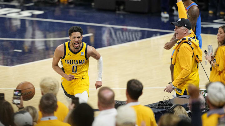 Jun 11, 2025; Indianapolis, Indiana, USA; Indiana Pacers guard Tyrese Haliburton (0) reacts after a play against the Oklahoma City Thunder during the second half during game three of the 2025 NBA Finals at Gainbridge Fieldhouse. Mandatory Credit: Kyle Terada-Imagn Images