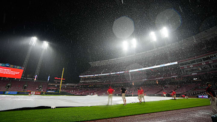 Jun 6, 2025; Cincinnati, OH, USA; The rain starts to pour during the Reds vs. Diamondbacks game at Great American Ball Park on Friday June 6, 2025. Mandatory Credit: Phil Didion-USA TODAY Network via Imagn Images