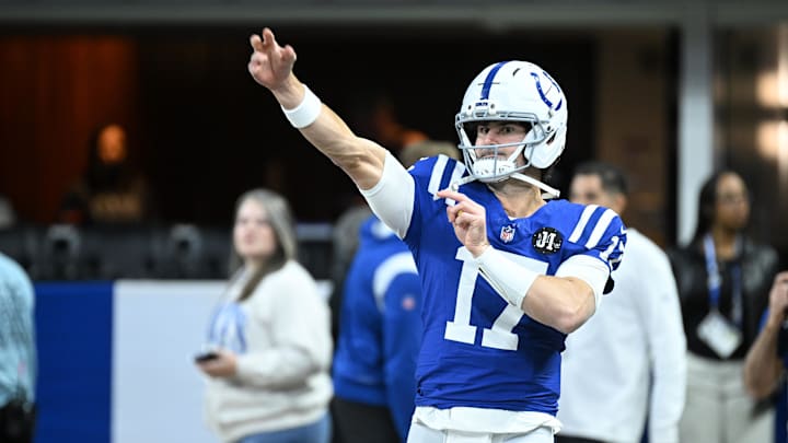 Nov 30, 2025; Indianapolis, Indiana, USA;  Indianapolis Colts quarterback Daniel Jones (17) warms up before a game against the Houston Texans at Lucas Oil Stadium. Mandatory Credit: Robert Goddin-Imagn Images