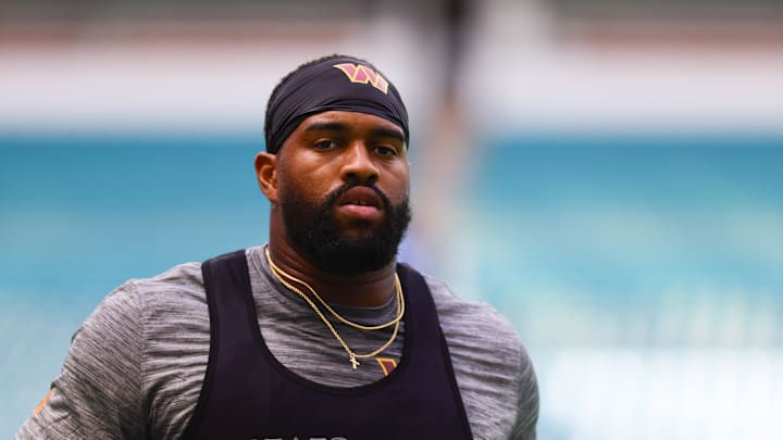 Aug 17, 2024; Miami Gardens, Florida, USA; Washington Commanders defensive tackle Jonathan Allen (93) warms up before a preseason game against the Miami Dolphins at Hard Rock Stadium. Mandatory Credit: Sam Navarro-Imagn Images