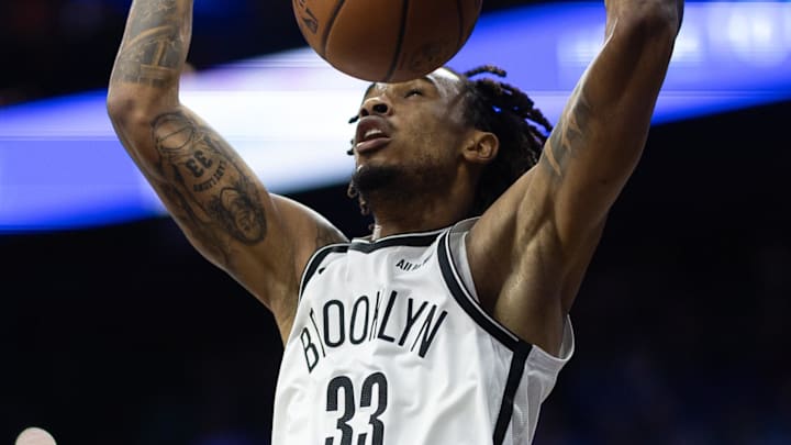 Dec 23, 2025; Philadelphia, Pennsylvania, USA; Brooklyn Nets center Nic Claxton (33) dunks the ball against the Philadelphia 76ers during the second quarter at Xfinity Mobile Arena. Mandatory Credit: Bill Streicher-Imagn Images