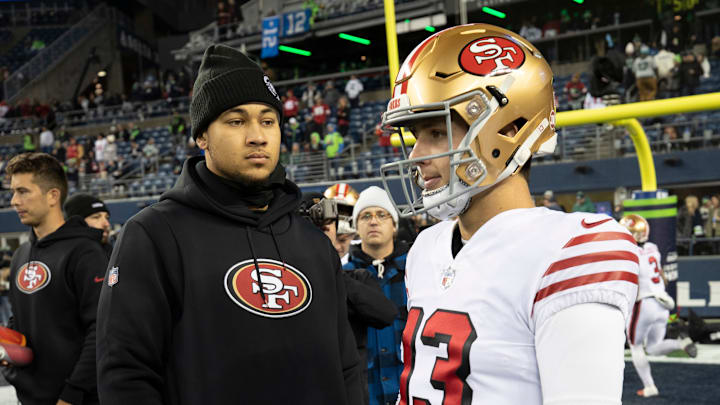 San Francisco 49ers quarterbacks Trey Lance (L) and Brock Purdy (R)