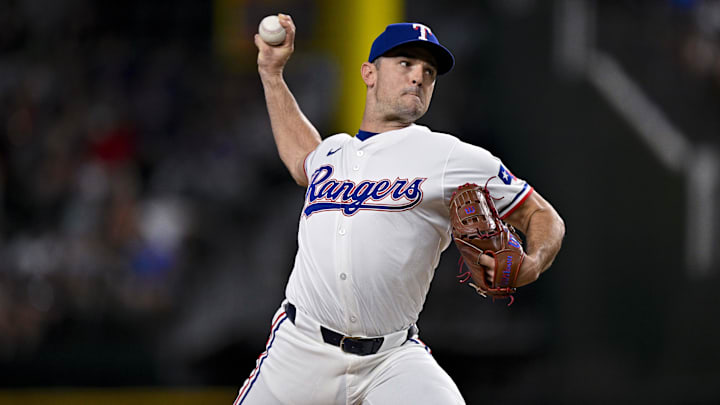 Aug 3, 2024; Arlington, Texas, USA;  Texas Rangers relief pitcher David Robertson (37) pitches against the Boston Red Sox during the seventh inning at Globe Life Field.