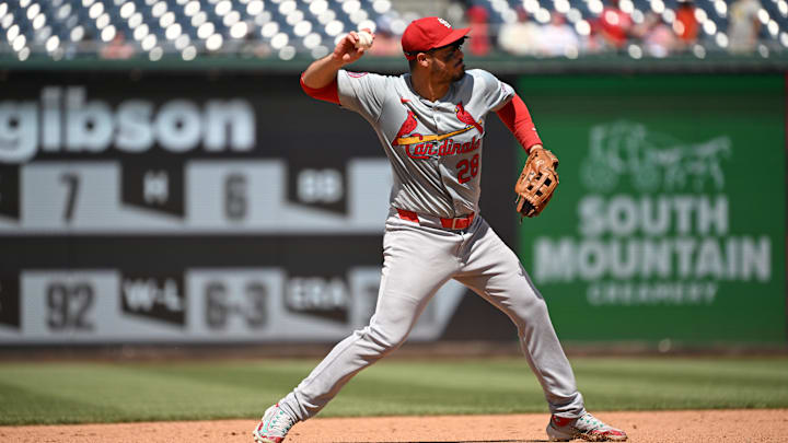 Jul 7, 2024; Washington, District of Columbia, USA; St. Louis Cardinals third baseman Nolan Arenado (28) prepares the throw to first base against the Washington Nationals during the fifth inning at Nationals Park.