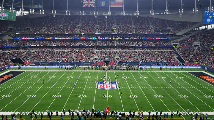 Oct 13, 2024; London, United Kingdom; A general view as Jacksonville Jaguars quarterback Trevor Lawrence (16) prepares to take the snap against the Chicago Bears on the NFL shield logo during an NFL International Series game at Tottenham Hotspur Stadium. Mandatory Credit: Kirby Lee-Imagn Images
