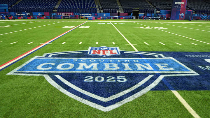 The 2025 NFL Scouting Combine logo on the field at Lucas Oil Stadium. 