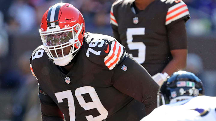 Cleveland Browns offensive tackle Dawand Jones (79) eyes down Baltimore Ravens linebacker Tavius Robinson (95) during the first half of an NFL football game at Huntington Bank Field, Sunday, Oct. 27, 2024, in Cleveland, Ohio. Cleveland Browns offensive tackle Dawand Jones (79) eyes down Baltimore Ravens linebacker Tavius Robinson (95) during the first half of an NFL football game at Huntington Bank Field, Sunday, Oct. 27, 2024, in Cleveland, Ohio.