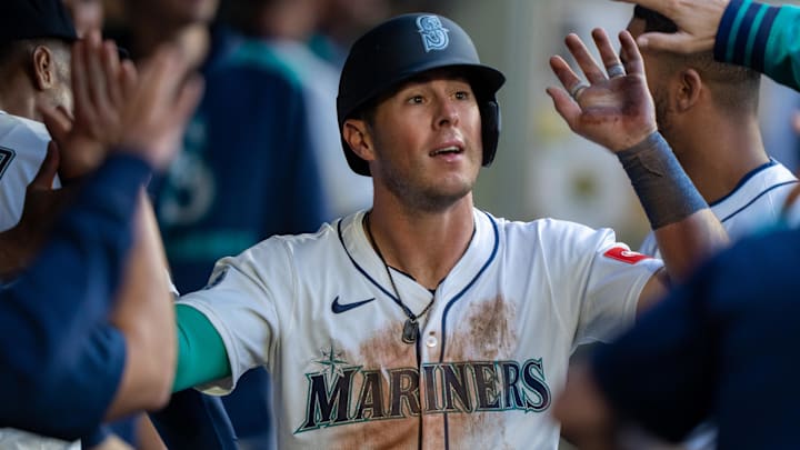 Seattle Mariners second baseman Dylan Moore celebrates after scoring a run against the Washington Nationals on May 27 at T-Mobile Park. Seattle Mariners second baseman Dylan Moore celebrates after scoring a run against the Washington Nationals on May 27 at T-Mobile Park.