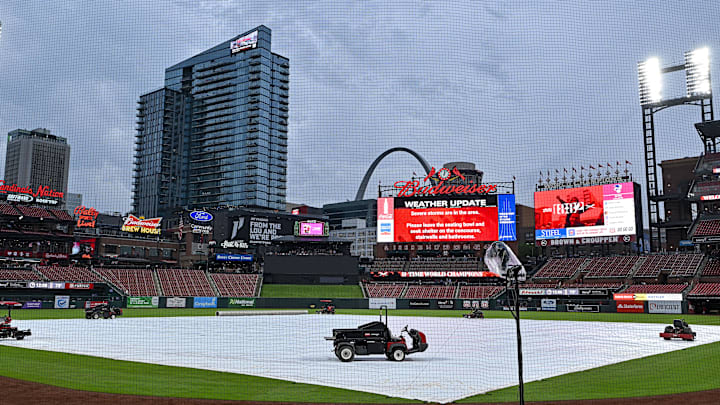 May 8, 2024; St. Louis, Missouri, USA;  A general view of the tarp on the field as storms move through the St. Louis region delaying a game between the St. Louis Cardinals and the New York Mets at Busch Stadium. Mandatory Credit: Jeff Curry-Imagn Images