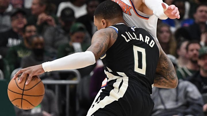 Apr 7, 2024; Milwaukee, Wisconsin, USA; Milwaukee Bucks guard Damian Lillard (0) drives against the Knicks. 