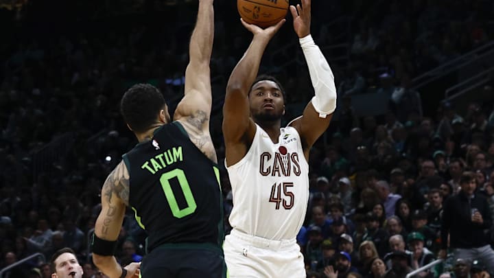 Feb 28, 2025; Boston, Massachusetts, USA; Cleveland Cavaliers guard Donovan Mitchell (45) shoots over Boston Celtics forward Jayson Tatum (0) during the second half at TD Garden. Mandatory Credit: Winslow Townson-Imagn Images Feb 28, 2025; Boston, Massachusetts, USA; Cleveland Cavaliers guard Donovan Mitchell (45) shoots over Boston Celtics forward Jayson Tatum (0) during the second half at TD Garden. Mandatory Credit: Winslow Townson-Imagn Images