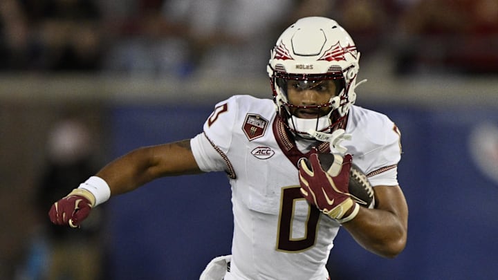 Sep 28, 2024; Dallas, Texas, USA; Florida State Seminoles wide receiver Ja'Khi Douglas (0) in action during the game between the Southern Methodist Mustangs and the Florida State Seminoles at Gerald J. Ford Stadium. Mandatory Credit: Jerome Miron-Imagn Images Sep 28, 2024; Dallas, Texas, USA; Florida State Seminoles wide receiver Ja'Khi Douglas (0) in action during the game between the Southern Methodist Mustangs and the Florida State Seminoles at Gerald J. Ford Stadium. Mandatory Credit: Jerome Miron-Imagn Images