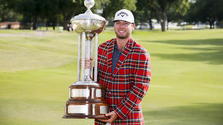 May 29, 2022; Fort Worth, Texas, USA; Sam Burns holds the winners trophy after winning the Charles