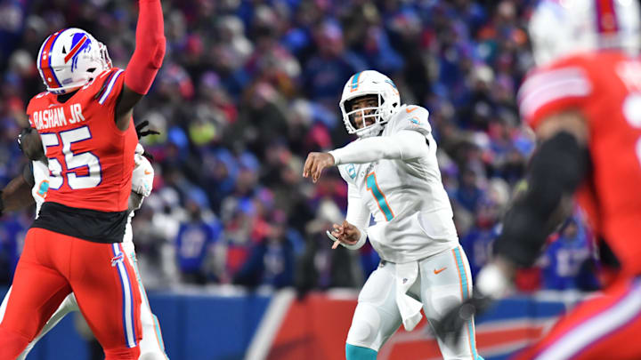 Dec 17, 2022; Orchard Park, New York, USA; Miami Dolphins quarterback Tua Tagovailoa (1) throws a