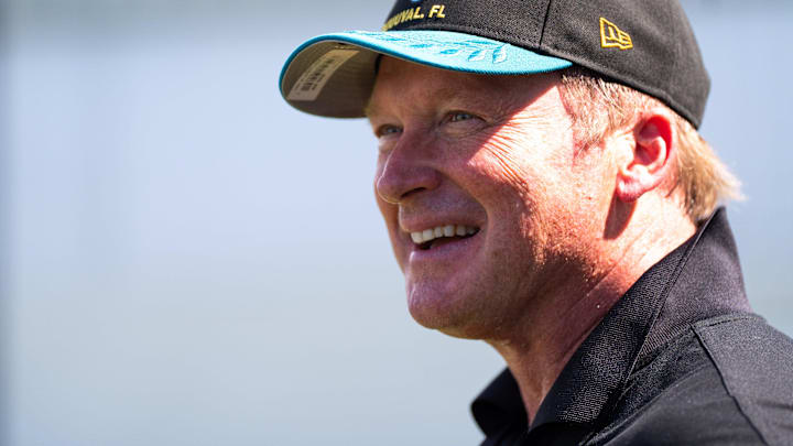 Former NFL Coach Jon Gruden have a laugh while attending an NFL training camp session ten at the Miller Electric Center, Tuesday, Aug. 5, 2025, in Jacksonville, Fla. [Doug Engle/Florida Times-Union]