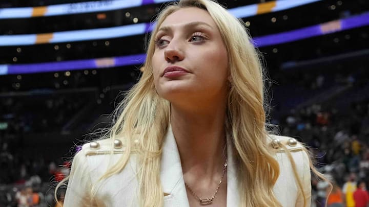 LA Sparks injured forward Cameron Brink leaves the floor after the game against the Las Vegas Aces at Crypto.com Arena.