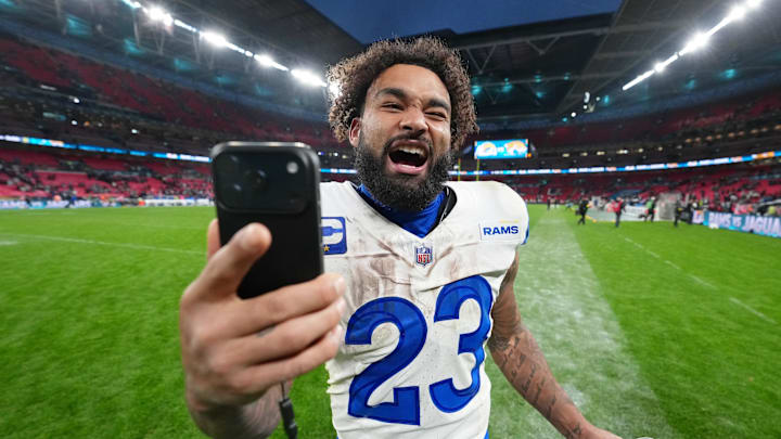 Oct 19, 2025; London, United Kingdom; Los Angeles Rams running back Kyren Williams (23) takes a video after their win against the Jacksonville Jaguars in an NFL International Series game at Wembley Stadium. Mandatory Credit: Kirby Lee-Imagn Images