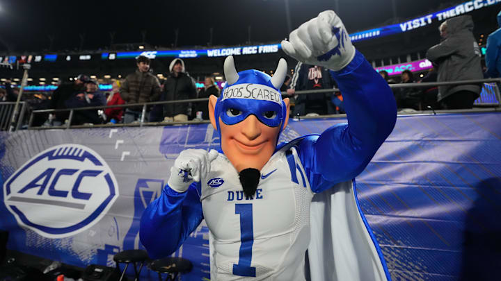 Dec 6, 2025; Charlotte, NC, USA; Duke Blue Devils mascot cheers during overtime against the Virginia Cavaliers during the 2025 ACC Championship game at Bank of America Stadium. Mandatory Credit: Bob Donnan-Imagn Images