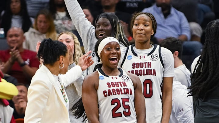 Mar 30, 2026; Sacramento, CA, USA;  South Carolina Gamecocks guard Raven Johnson (25) and forward Maryam Dauda (30) celebrate after the Gamecocks scored against the Texas Christian University Horned Frogs in an Elite Eight game in the Sacramento Regional 4 of the women's 2026 NCAA Tournament at the Golden 1 Center. Mandatory Credit: Ed Szczepanski-Imagn Images