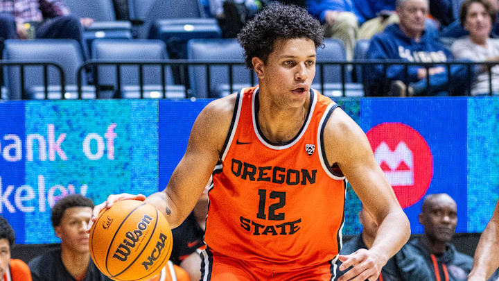 February 22, 2024; Berkeley, California, USA; Oregon State Beavers forward Michael Rataj (12) dribbles the basketball during the second half against the California Golden Bears at Haas Pavilion. Mandatory Credit: Kyle Terada-Imagn Images February 22, 2024; Berkeley, California, USA; Oregon State Beavers forward Michael Rataj (12) dribbles the basketball during the second half against the California Golden Bears at Haas Pavilion. Mandatory Credit: Kyle Terada-Imagn Images